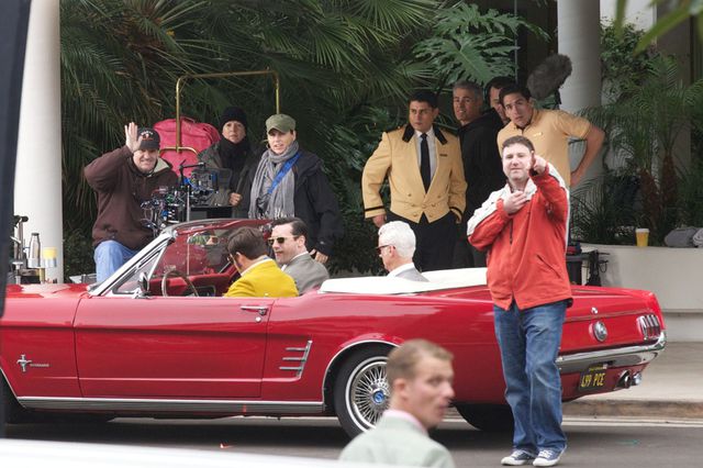 Don Draper, Roger Sterling, and Harry Crane in a '66 Mustang